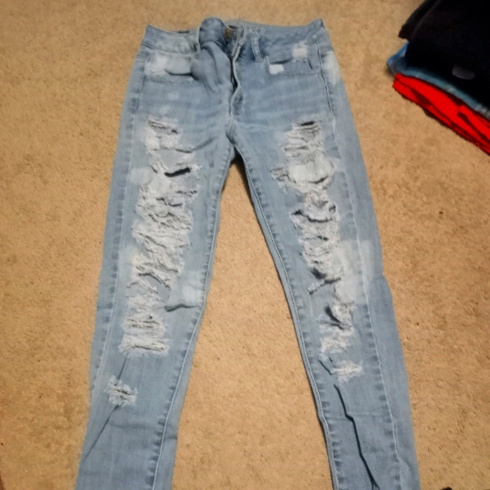 Distressed white washed jeans